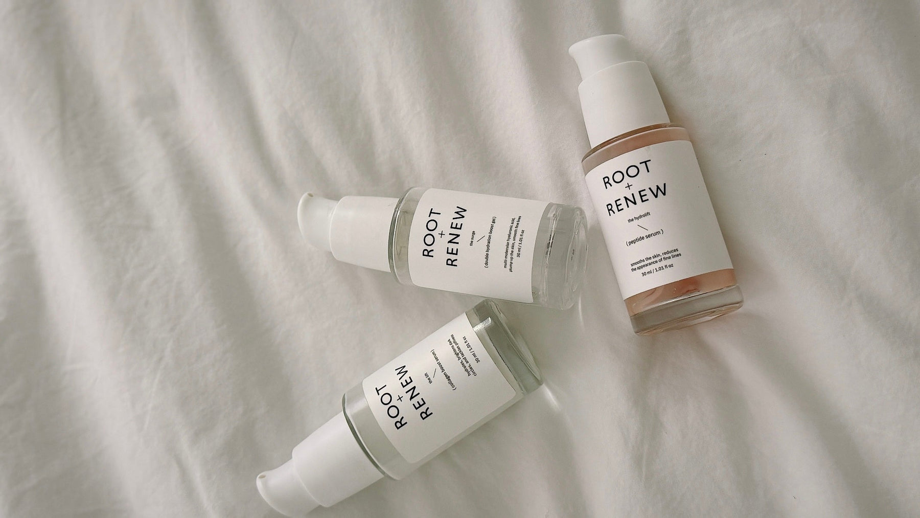 Minimalist skincare routine with cleanser, targeted serum, moisturizer and sunscreen