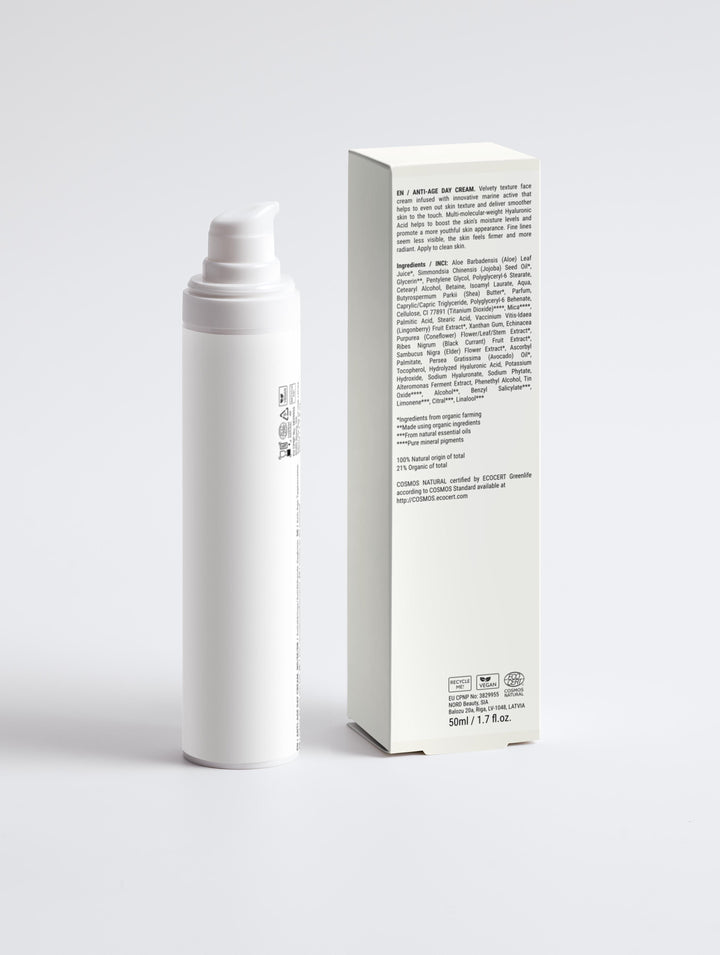 Back of Root + Renew The Day Shift anti-age cream with box showing ingredients list and COSMOS, vegan, and recyclable certifications