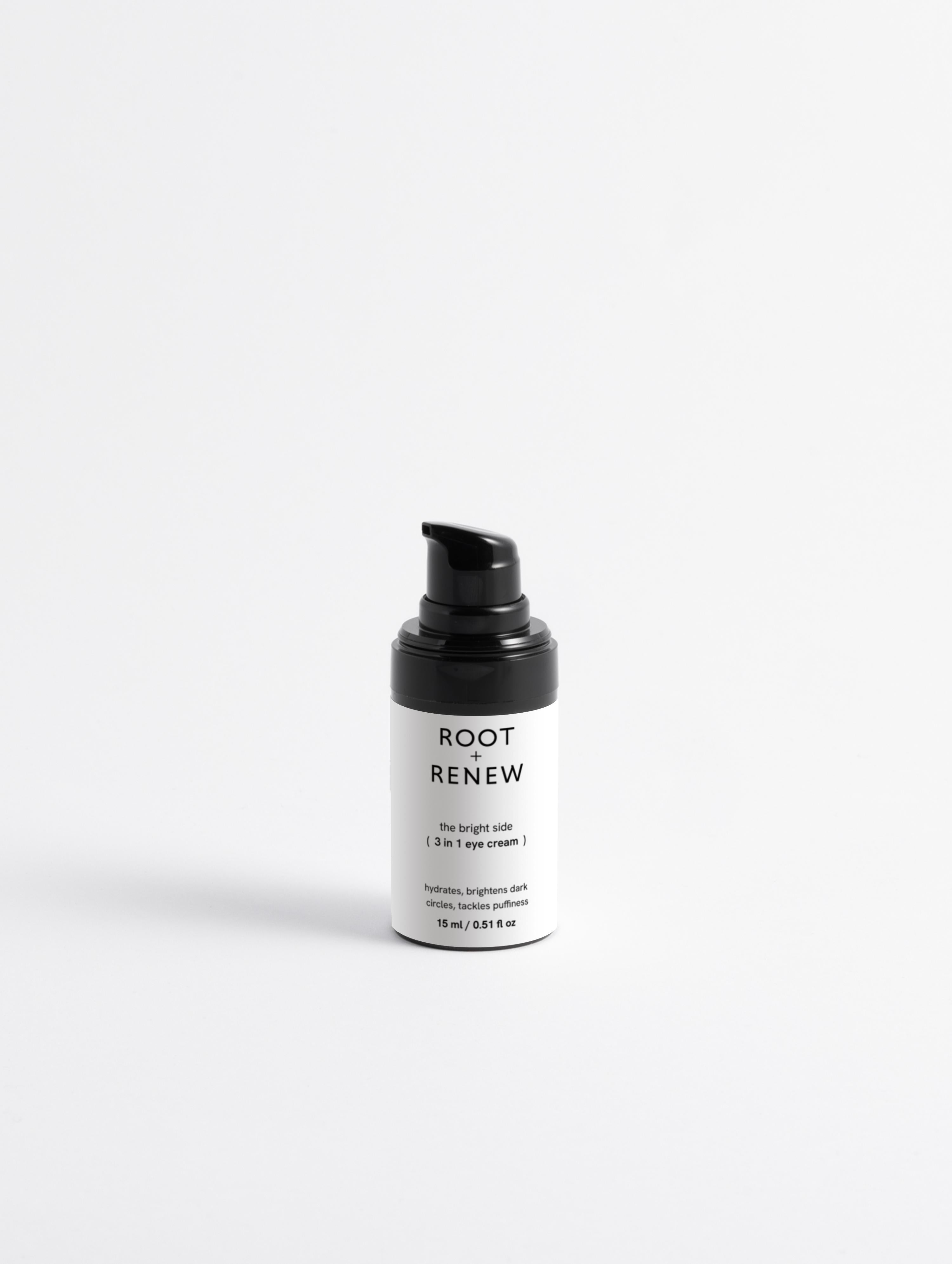Root + Renew The Bright Side 3-in-1 Eye Cream bottle with pump dispenser on clean white background.