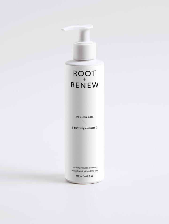 Front view of Root + Renew The Clean Slate Purifying Cleanser with minimalist label and white pump packaging on a clean studio background
