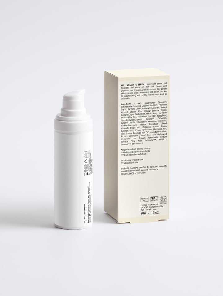 Back view of Root + Renew The Healthy Glow Vitamin C Serum and box, featuring ingredients, COSMOS Natural, vegan, and recyclable packaging details