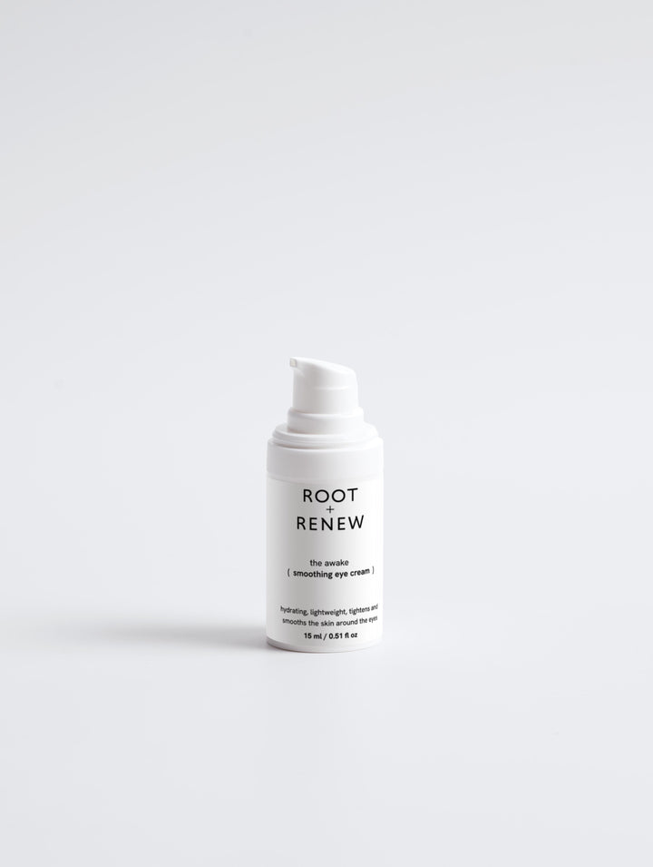 Clean, isolated image of The Awake Smoothing Eye Cream from Root + Renew against a white background, showcasing its sleek pump packaging.