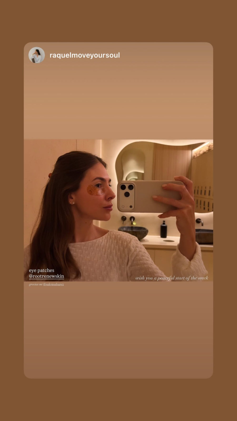 Customer mirror selfie wearing Root + Renew hydrogel eye patches