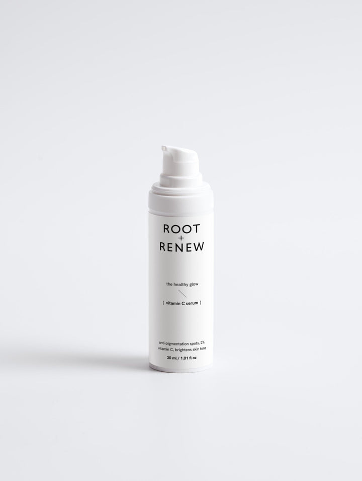 Isolated product shot of The Healthy Glow Vitamin C Serum bottle on a clean white background.